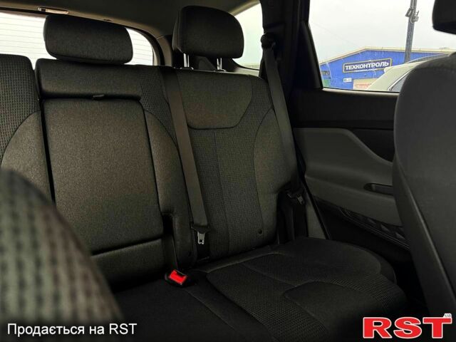 Черный Хендай Санта Фе, объемом двигателя 2.4 л и пробегом 150 тыс. км за 19900 $, фото 1 на Automoto.ua