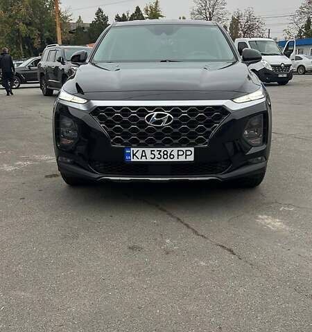 Черный Хендай Санта Фе, объемом двигателя 2.36 л и пробегом 150 тыс. км за 19900 $, фото 1 на Automoto.ua