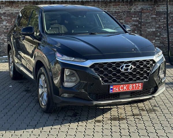 Черный Хендай Санта Фе, объемом двигателя 2.4 л и пробегом 49 тыс. км за 23000 $, фото 1 на Automoto.ua