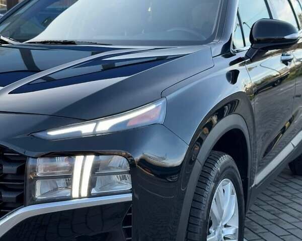 Черный Хендай Санта Фе, объемом двигателя 2.5 л и пробегом 30 тыс. км за 32300 $, фото 1 на Automoto.ua