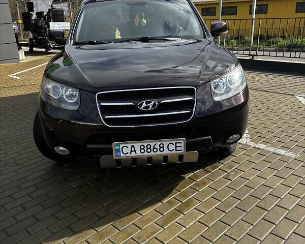 Хендай Санта Фе 2008 в Черкассах на Automoto.ua Фиолетовый Хендай Санта Фе, объемом двигателя 2.19 л и пробегом 300 тыс. км за 9188 $, фото 1 на Automoto.ua
