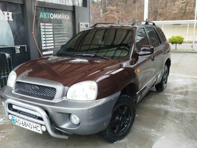 Коричневый Хендай Санта Фе, объемом двигателя 2.4 л и пробегом 270 тыс. км за 4400 $, фото 1 на Automoto.ua