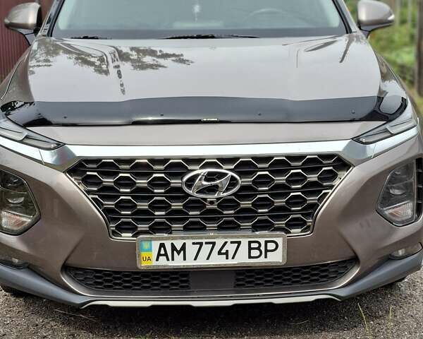 Коричневый Хендай Санта Фе, объемом двигателя 2.4 л и пробегом 94 тыс. км за 26555 $, фото 1 на Automoto.ua