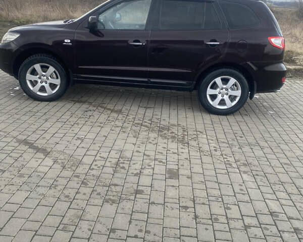 Красный Хендай Санта Фе, объемом двигателя 2.19 л и пробегом 200 тыс. км за 9000 $, фото 1 на Automoto.ua