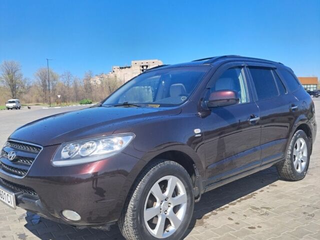 Красный Хендай Санта Фе, объемом двигателя 2.7 л и пробегом 185 тыс. км за 9700 $, фото 1 на Automoto.ua