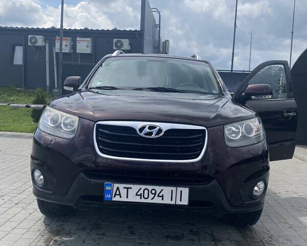 Красный Хендай Санта Фе, объемом двигателя 2.2 л и пробегом 190 тыс. км за 11499 $, фото 1 на Automoto.ua