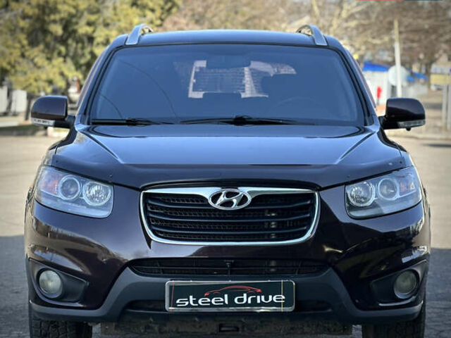 Красный Хендай Санта Фе, объемом двигателя 2.2 л и пробегом 242 тыс. км за 12999 $, фото 1 на Automoto.ua