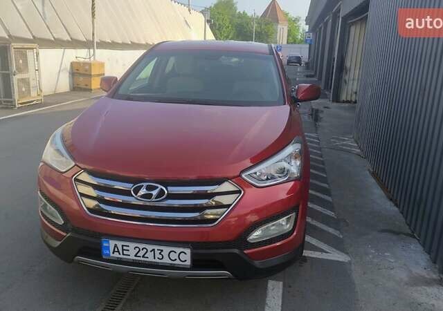 Красный Хендай Санта Фе, объемом двигателя 2.4 л и пробегом 145 тыс. км за 13900 $, фото 1 на Automoto.ua