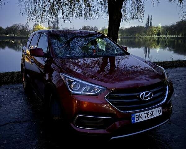 Красный Хендай Санта Фе, объемом двигателя 2.36 л и пробегом 194 тыс. км за 13500 $, фото 1 на Automoto.ua