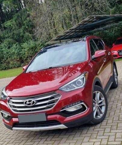 Красный Хендай Санта Фе, объемом двигателя 2 л и пробегом 57 тыс. км за 12500 $, фото 1 на Automoto.ua