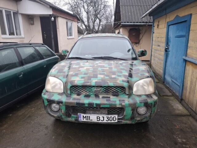 Хендай Санта Фе, объемом двигателя 2 л и пробегом 154 тыс. км за 1700 $, фото 1 на Automoto.ua