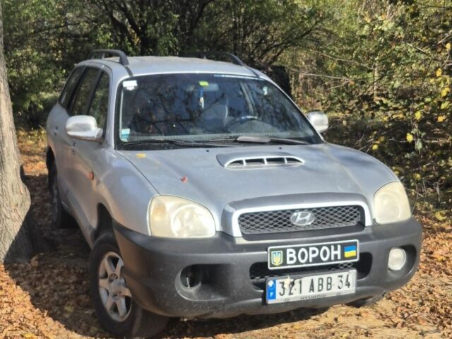 Серый Хендай Санта Фе, объемом двигателя 2 л и пробегом 260 тыс. км за 3597 $, фото 1 на Automoto.ua