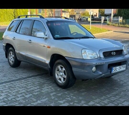 Серый Хендай Санта Фе, объемом двигателя 2 л и пробегом 235 тыс. км за 3346 $, фото 1 на Automoto.ua