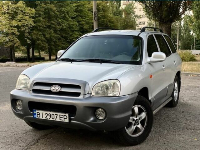 Серый Хендай Санта Фе, объемом двигателя 2.7 л и пробегом 270 тыс. км за 6250 $, фото 1 на Automoto.ua