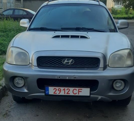 Сірий Хендай Санта Фе, об'ємом двигуна 2 л та пробігом 200 тис. км за 3546 $, фото 1 на Automoto.ua