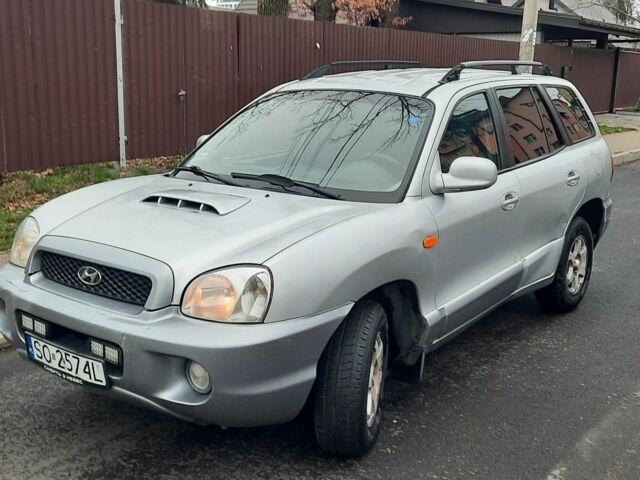 Серый Хендай Санта Фе, объемом двигателя 2 л и пробегом 373 тыс. км за 2900 $, фото 1 на Automoto.ua