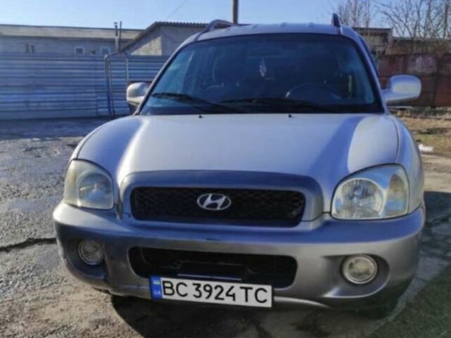 Серый Хендай Санта Фе, объемом двигателя 2 л и пробегом 312 тыс. км за 6000 $, фото 1 на Automoto.ua