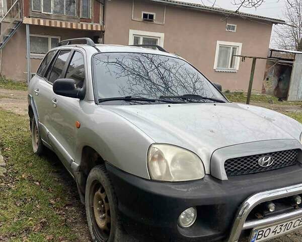 Серый Хендай Санта Фе, объемом двигателя 2.4 л и пробегом 250 тыс. км за 5000 $, фото 1 на Automoto.ua