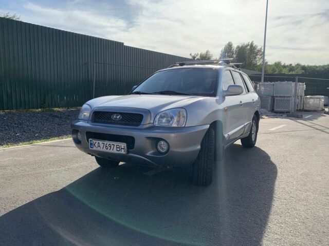 Серый Хендай Санта Фе, объемом двигателя 2.7 л и пробегом 270 тыс. км за 4800 $, фото 1 на Automoto.ua