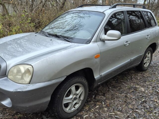 Серый Хендай Санта Фе, объемом двигателя 2 л и пробегом 316 тыс. км за 3801 $, фото 1 на Automoto.ua