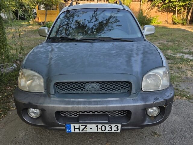 Серый Хендай Санта Фе, объемом двигателя 2 л и пробегом 343 тыс. км за 2999 $, фото 1 на Automoto.ua