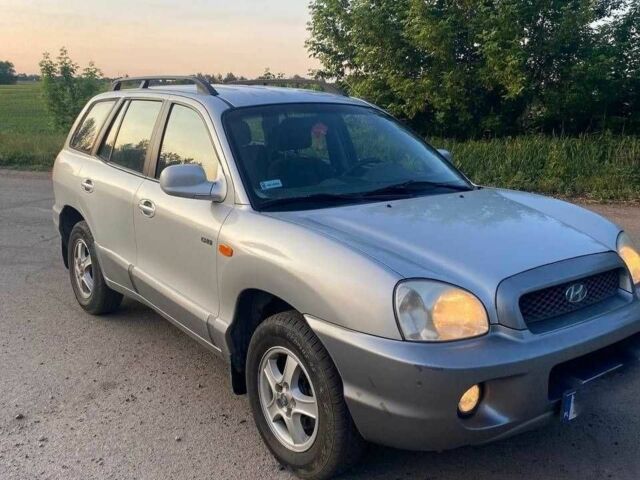Серый Хендай Санта Фе, объемом двигателя 2 л и пробегом 233 тыс. км за 3500 $, фото 1 на Automoto.ua