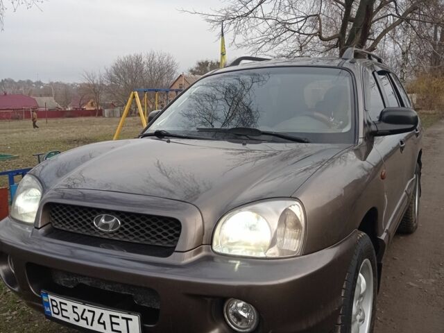 Серый Хендай Санта Фе, объемом двигателя 2.4 л и пробегом 320 тыс. км за 4500 $, фото 1 на Automoto.ua