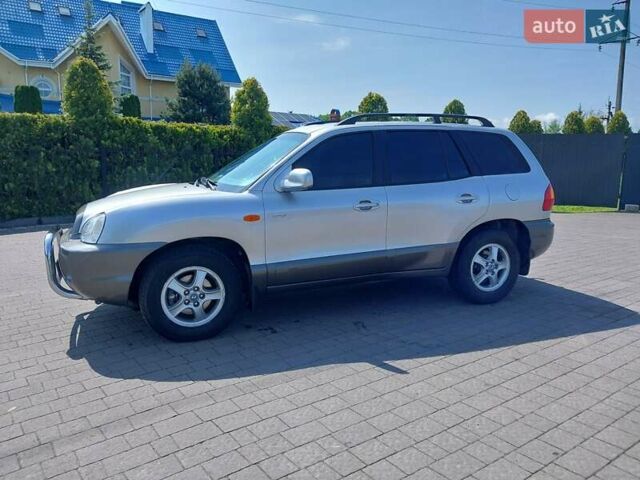 Серый Хендай Санта Фе, объемом двигателя 2 л и пробегом 290 тыс. км за 5950 $, фото 1 на Automoto.ua