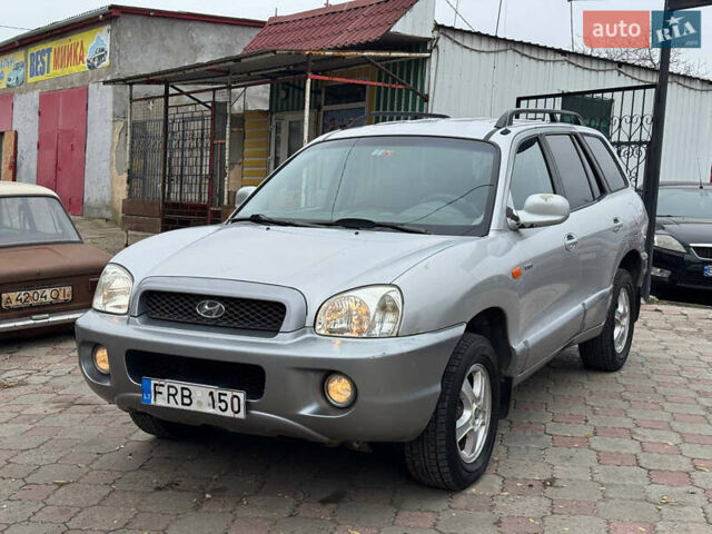 Серый Хендай Санта Фе, объемом двигателя 2 л и пробегом 300 тыс. км за 3199 $, фото 1 на Automoto.ua