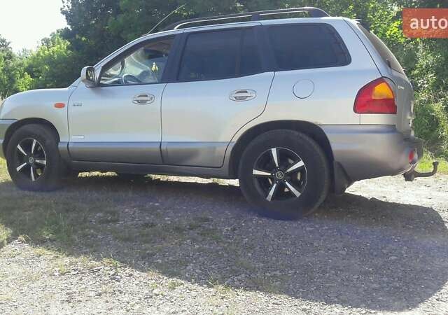 Серый Хендай Санта Фе, объемом двигателя 2 л и пробегом 425 тыс. км за 5100 $, фото 1 на Automoto.ua