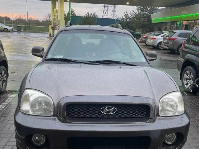 Серый Хендай Санта Фе, объемом двигателя 2 л и пробегом 280 тыс. км за 3800 $, фото 1 на Automoto.ua