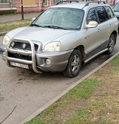 Сірий Хендай Санта Фе, об'ємом двигуна 2 л та пробігом 200 тис. км за 3809 $, фото 1 на Automoto.ua