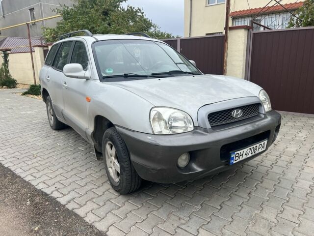 Серый Хендай Санта Фе, объемом двигателя 2.4 л и пробегом 260 тыс. км за 4200 $, фото 1 на Automoto.ua