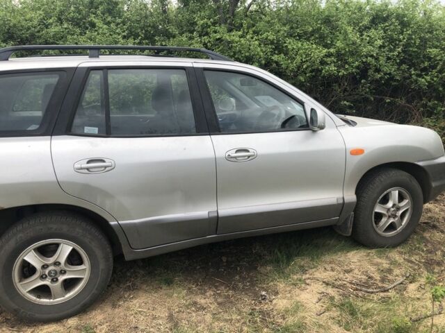 Серый Хендай Санта Фе, объемом двигателя 2 л и пробегом 280 тыс. км за 3000 $, фото 1 на Automoto.ua