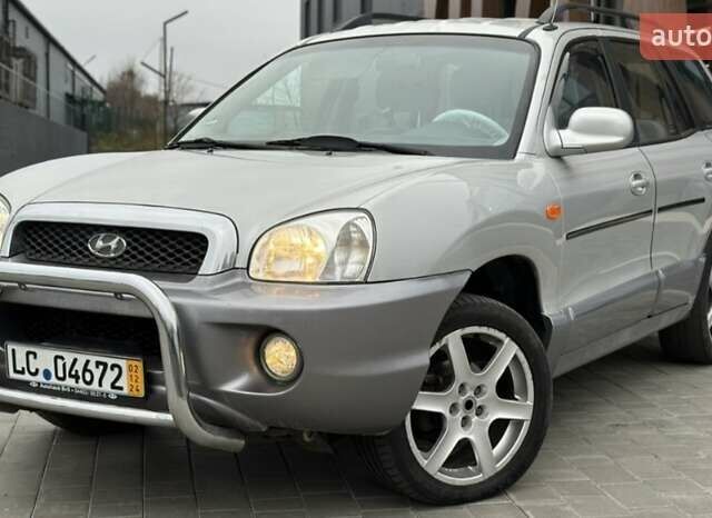 Серый Хендай Санта Фе, объемом двигателя 2.4 л и пробегом 220 тыс. км за 6750 $, фото 1 на Automoto.ua