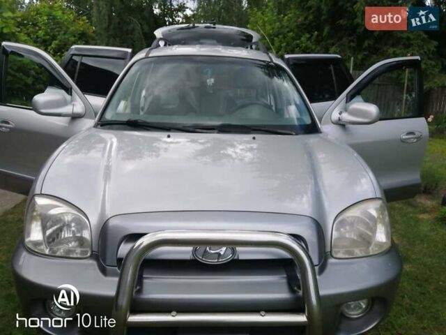 Серый Хендай Санта Фе, объемом двигателя 2.4 л и пробегом 263 тыс. км за 6350 $, фото 1 на Automoto.ua