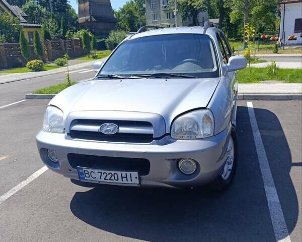 Серый Хендай Санта Фе, объемом двигателя 2 л и пробегом 313 тыс. км за 6300 $, фото 1 на Automoto.ua
