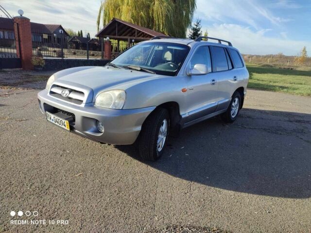 Серый Хендай Санта Фе, объемом двигателя 2 л и пробегом 237 тыс. км за 4200 $, фото 1 на Automoto.ua