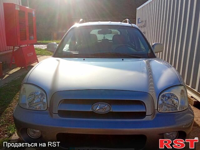 Серый Хендай Санта Фе, объемом двигателя 2 л и пробегом 252 тыс. км за 6000 $, фото 1 на Automoto.ua