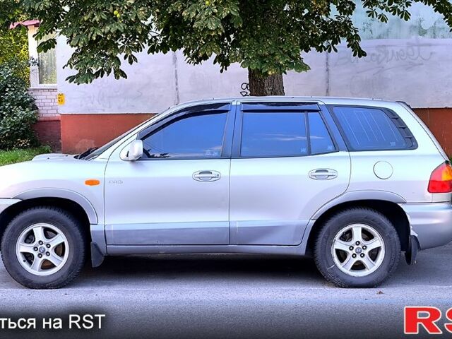 Серый Хендай Санта Фе, объемом двигателя 2 л и пробегом 290 тыс. км за 3500 $, фото 1 на Automoto.ua