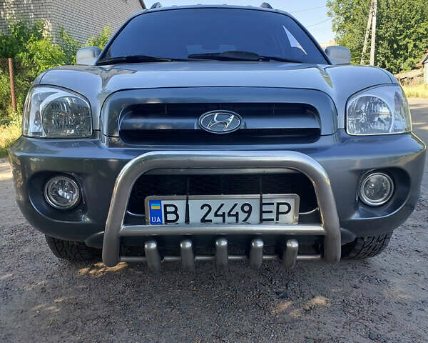 Серый Хендай Санта Фе, объемом двигателя 2 л и пробегом 200 тыс. км за 7650 $, фото 1 на Automoto.ua