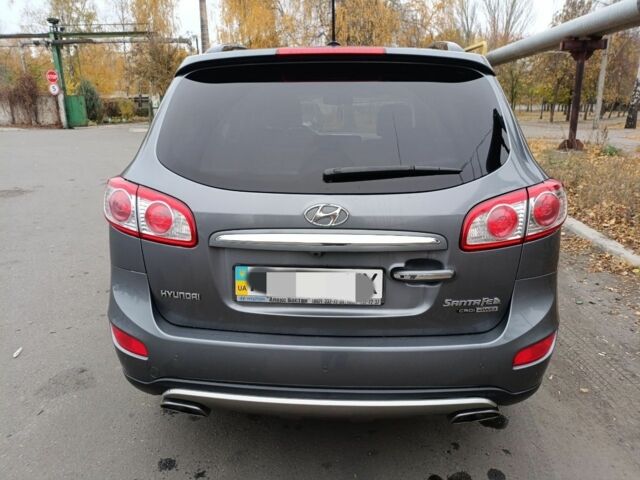 Серый Хендай Санта Фе, объемом двигателя 2.2 л и пробегом 125 тыс. км за 14500 $, фото 1 на Automoto.ua