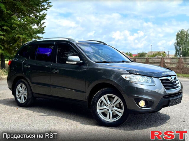Серый Хендай Санта Фе, объемом двигателя 2.4 л и пробегом 170 тыс. км за 11450 $, фото 1 на Automoto.ua