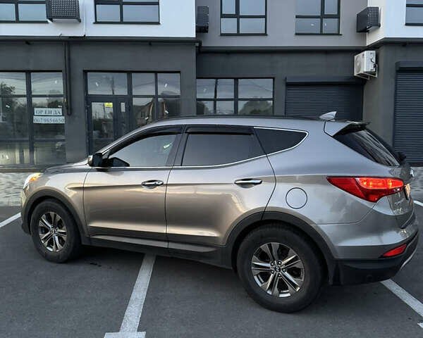 Серый Хендай Санта Фе, объемом двигателя 2.36 л и пробегом 202 тыс. км за 14800 $, фото 1 на Automoto.ua