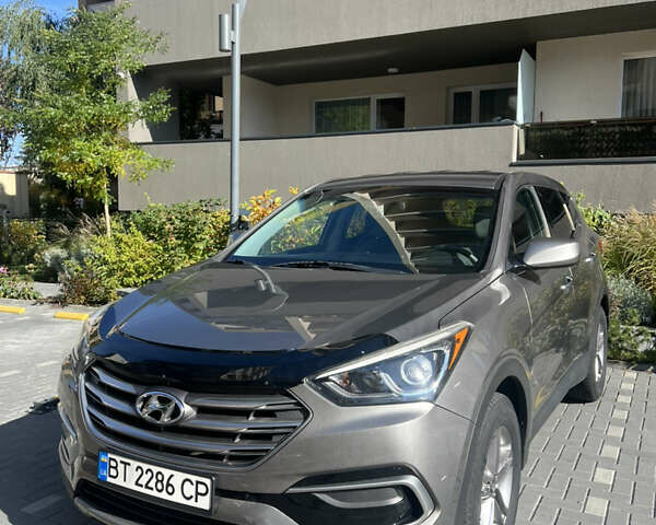 Серый Хендай Санта Фе, объемом двигателя 2.36 л и пробегом 145 тыс. км за 13500 $, фото 1 на Automoto.ua