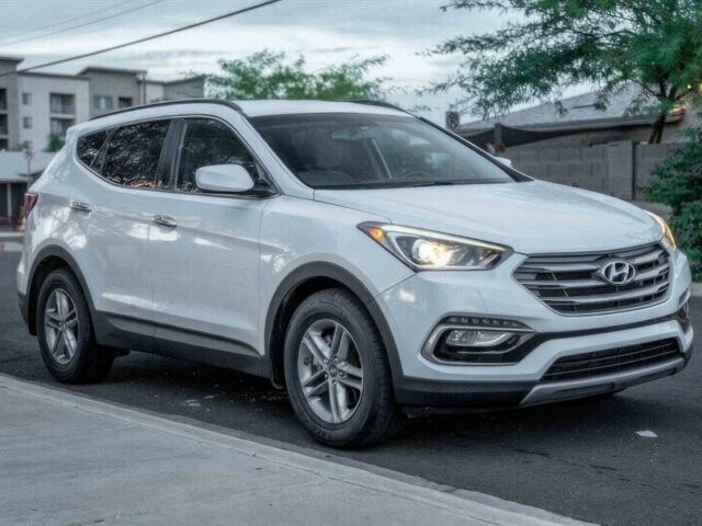Серый Хендай Санта Фе, объемом двигателя 2.4 л и пробегом 54 тыс. км за 11500 $, фото 1 на Automoto.ua