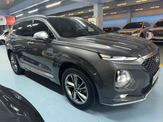 Серый Хендай Санта Фе, объемом двигателя 2 л и пробегом 125 тыс. км за 33000 $, фото 1 на Automoto.ua