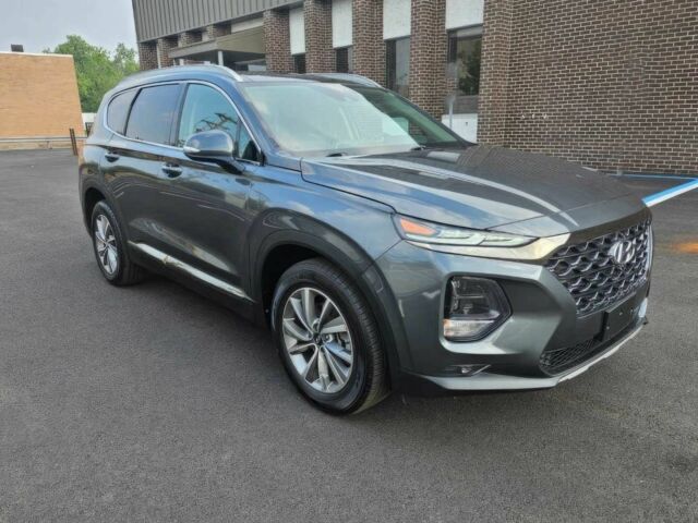 Серый Хендай Санта Фе, объемом двигателя 2.4 л и пробегом 34 тыс. км за 13000 $, фото 1 на Automoto.ua