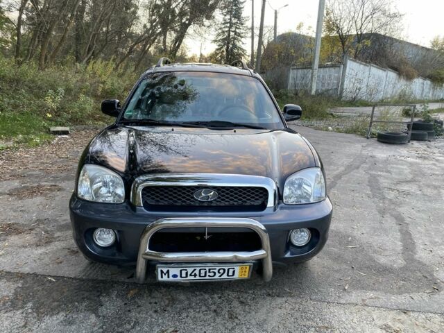 Синий Хендай Санта Фе, объемом двигателя 2.4 л и пробегом 145 тыс. км за 3900 $, фото 1 на Automoto.ua