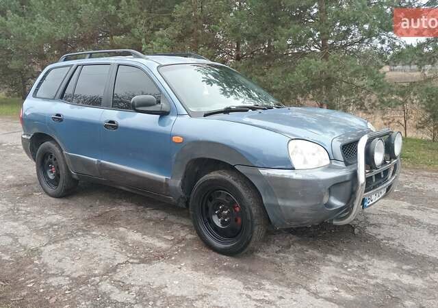 Синий Хендай Санта Фе, объемом двигателя 2.66 л и пробегом 300 тыс. км за 2350 $, фото 1 на Automoto.ua